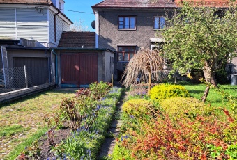 Dom do remontu w dzielnicy Ogrodów, 151 m², garaż